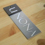 Cardboard tag with a plastic "Unona" 15,5x5,5 cm