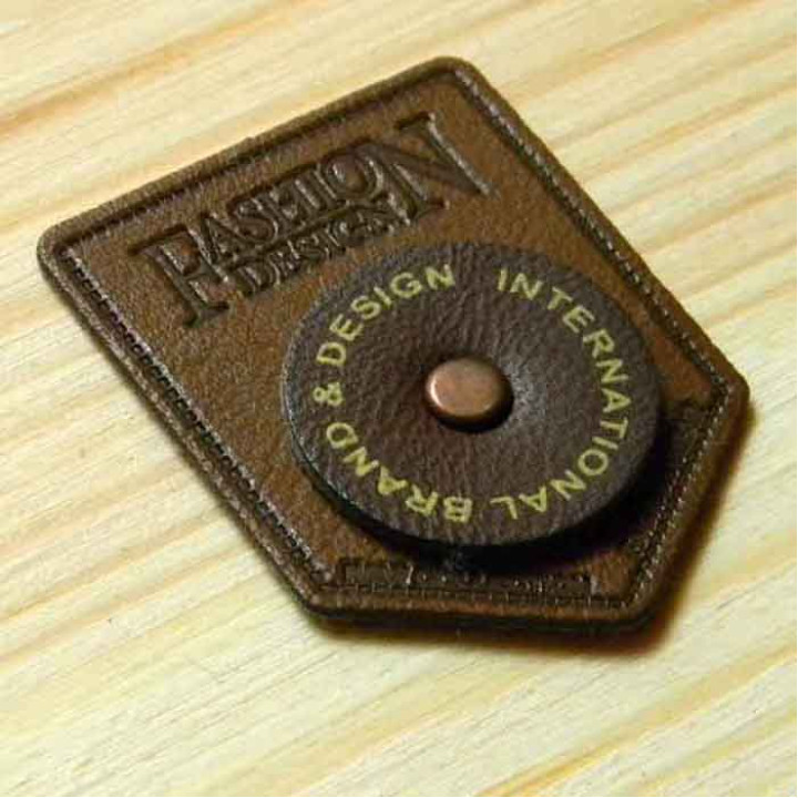 Leather label with rivet and patch