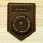 Leather label with rivet and patch