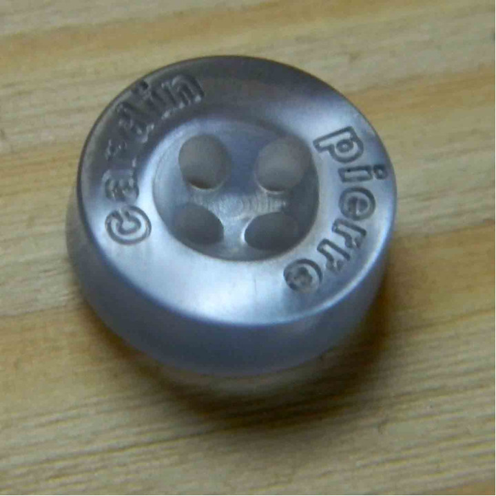 Plastic button by pearl 16L 10mm