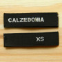 Тканый размерник-флажок с лого "Calzedonia" 8х1 см